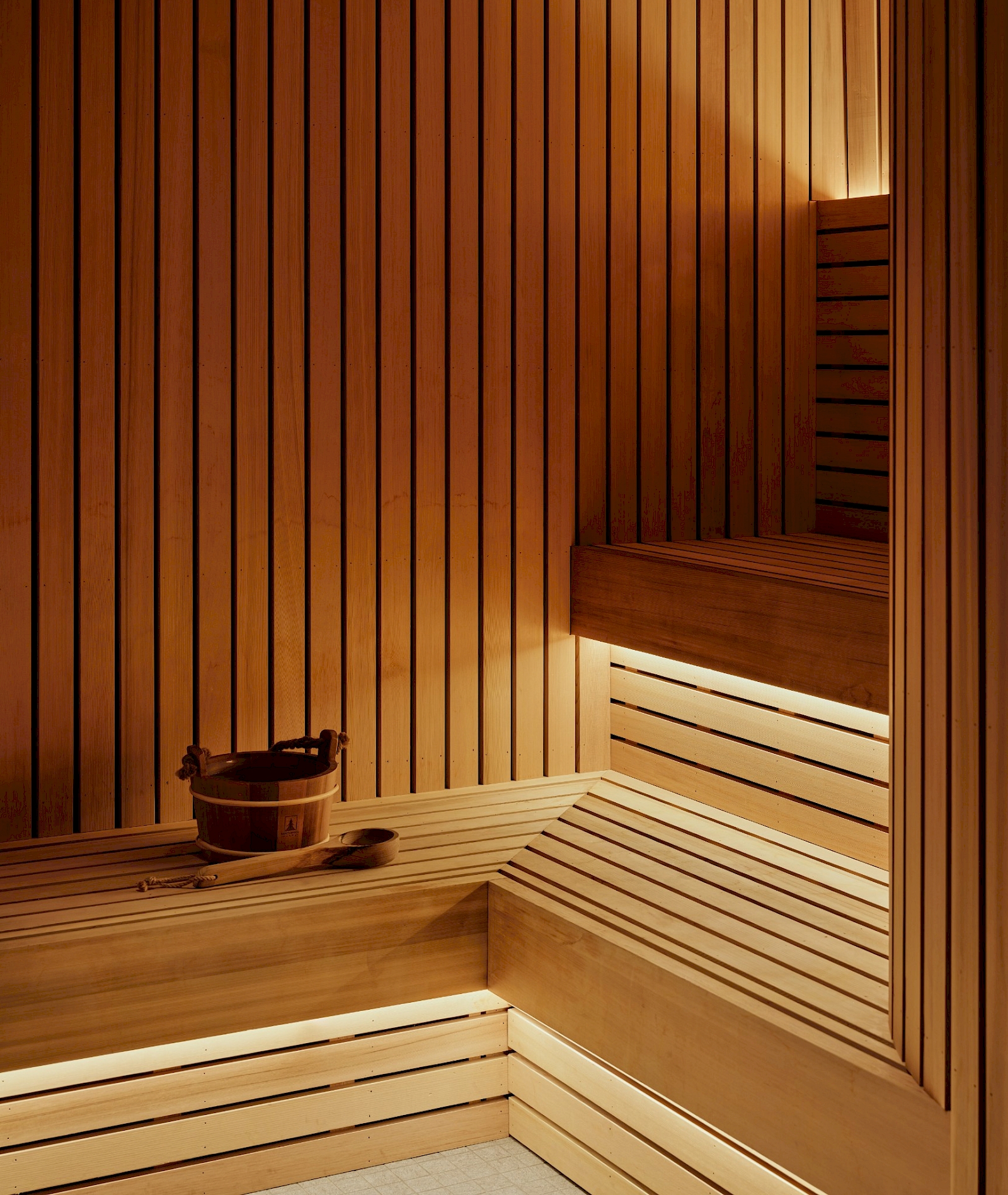 A stylish pale pink-tiled bathhouse