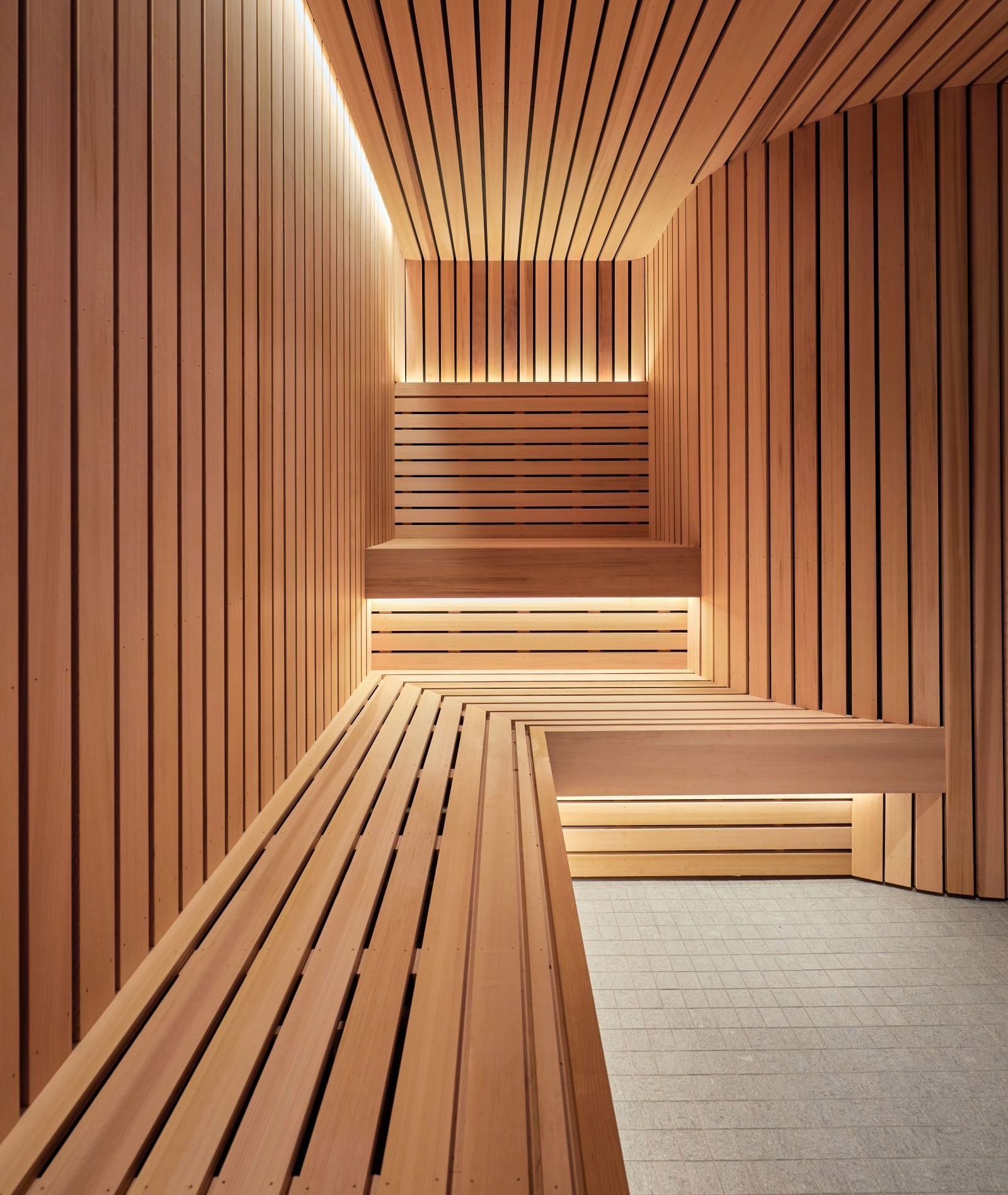 A stylish pale pink-tiled bathhouse